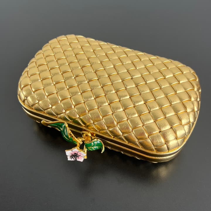 Bottega Veneta Woven Leather Floral Knot Clutch Bag in Gold Woven Leather With Floral Clasp