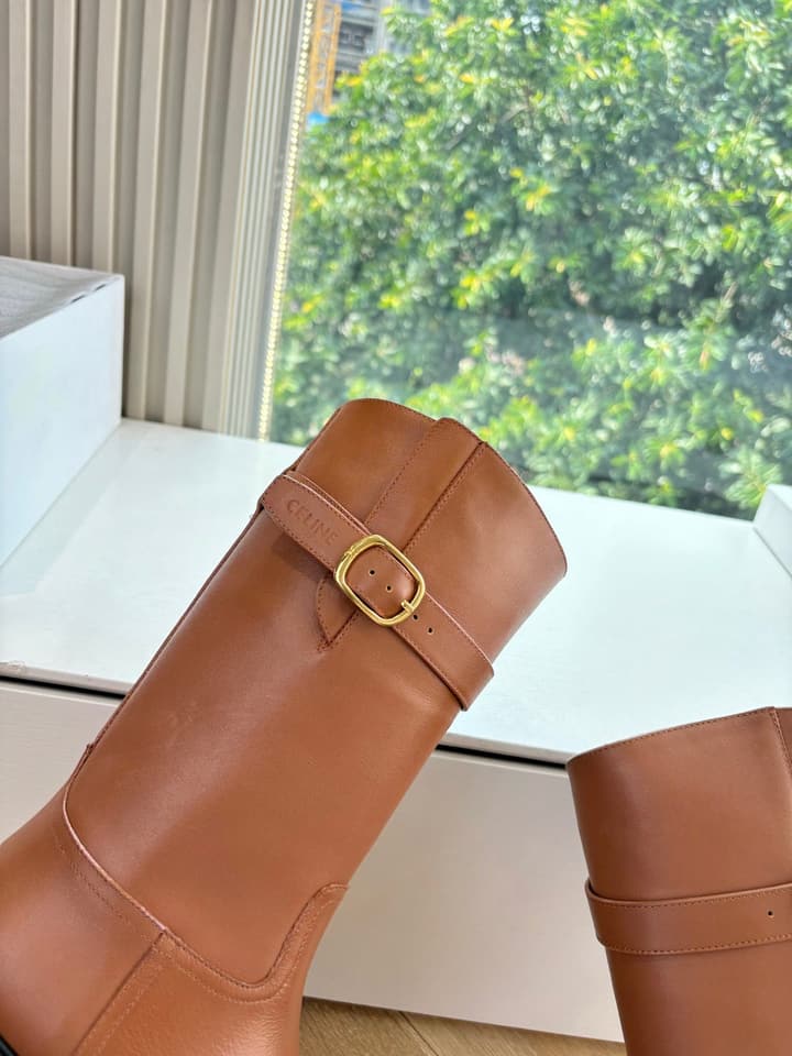 Celine Triomphe Knight Ankle Boots – 2025 Fall/Winter Collection in Black And Brown Leather Display