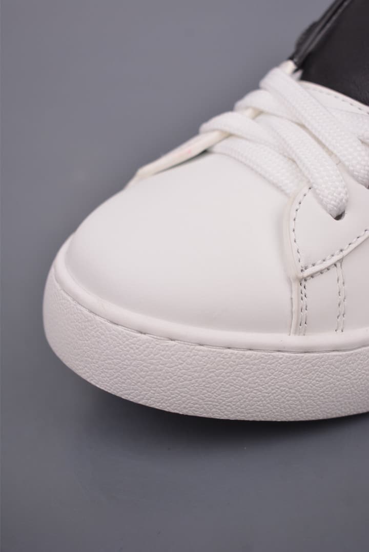Valentino Rockstud Untitled Rivet Sneakers – 2025 Collection in White With Black Band