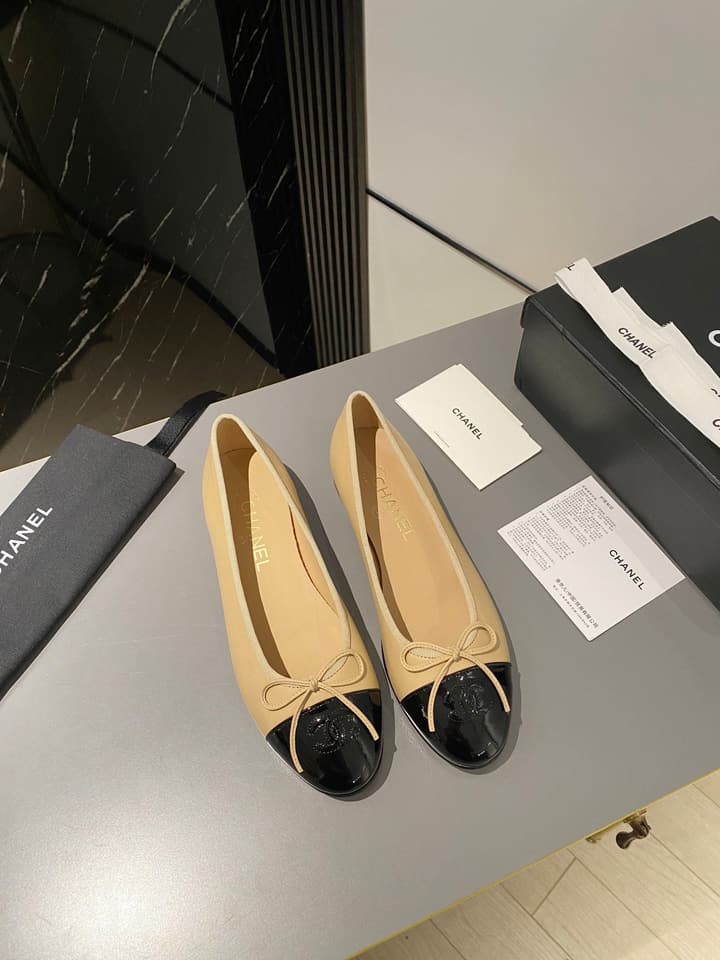 Chanel Classic Ballet Flats in Tan With Black Cap Toe