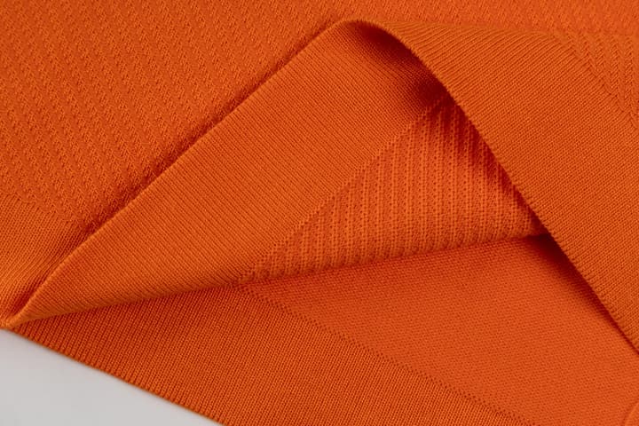 Hermès Retro Knitted Polo Shirt – SS24 in Black Polo With Orange Placket