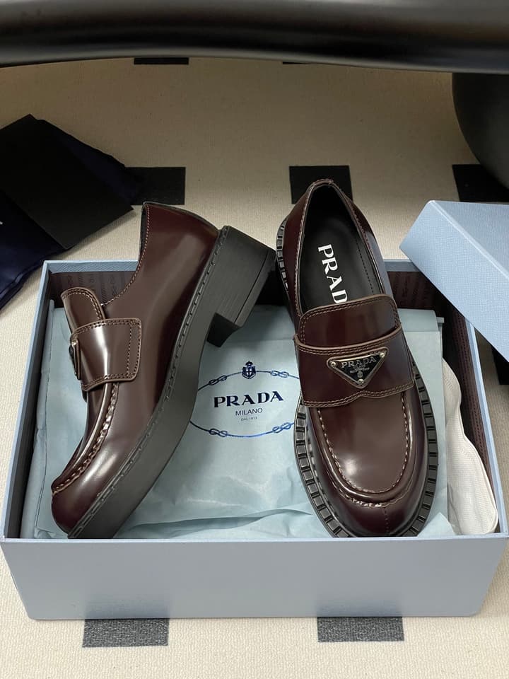 Prada Triangle Logo Platform Loafers in Black
