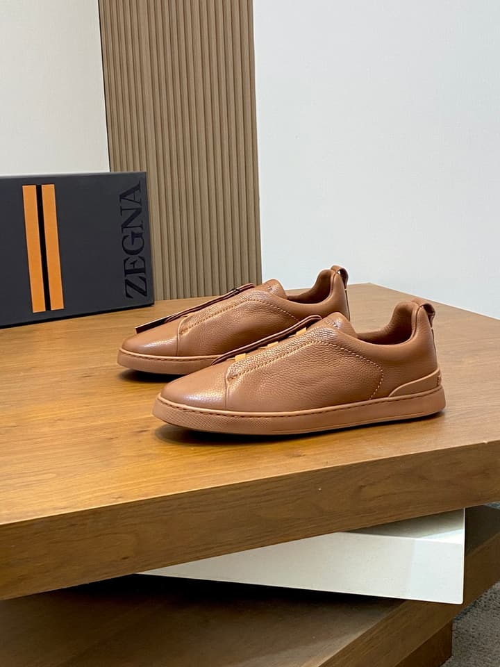 Ermenegildo Zegna Triple Stitch Sneakers in Black Leather With Brown Tag