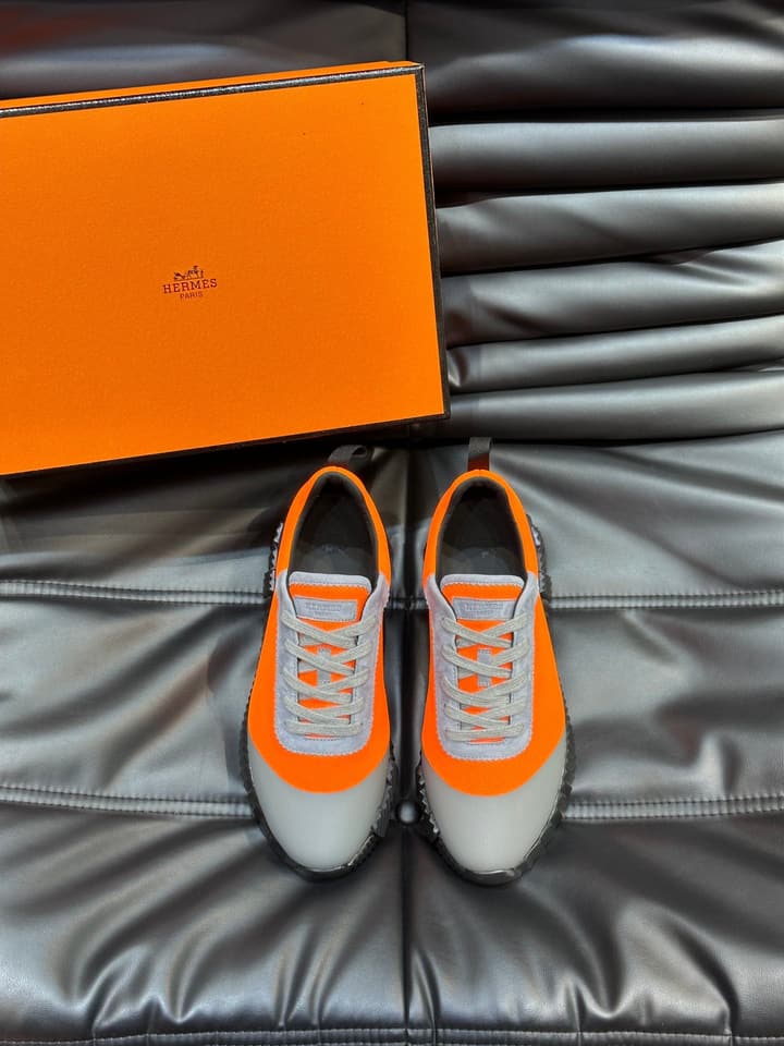 Hermès Bouncing Calfskin Mesh Sneakers in Black With White Stripe