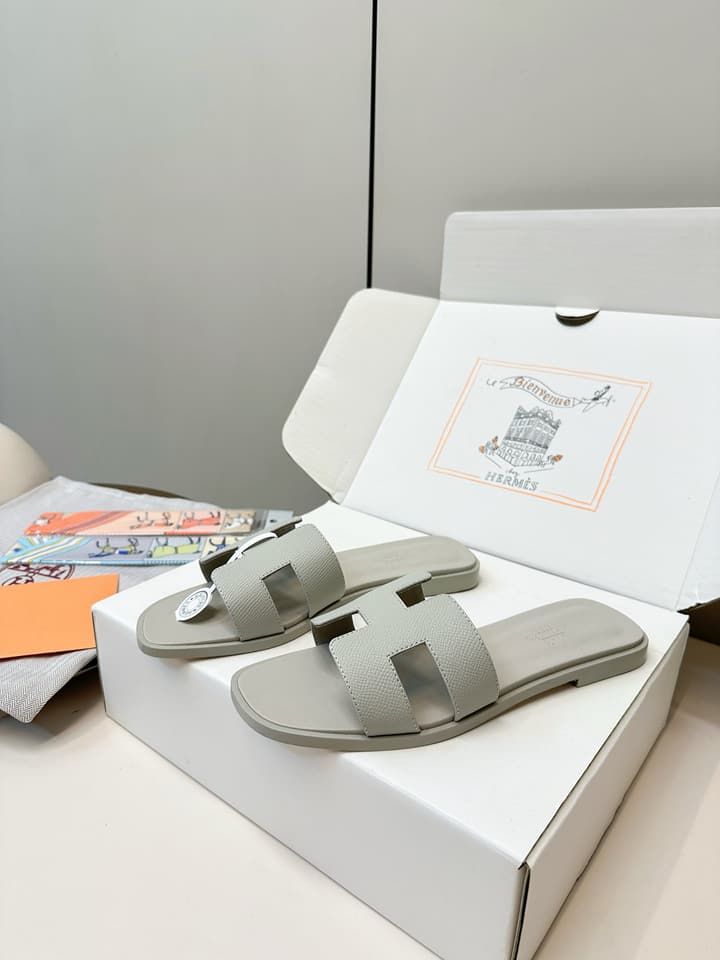 Hermès Palm Grain H-Slides in Bright Green