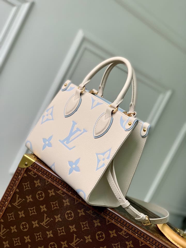 Louis Vuitton ONTHEGO Small Monogram Tote Bag in Cream With Blue Monogram