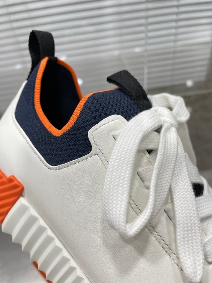 Hermès Sport Sneakers – Iconic Orange Edge in Black Knit With Black Laces