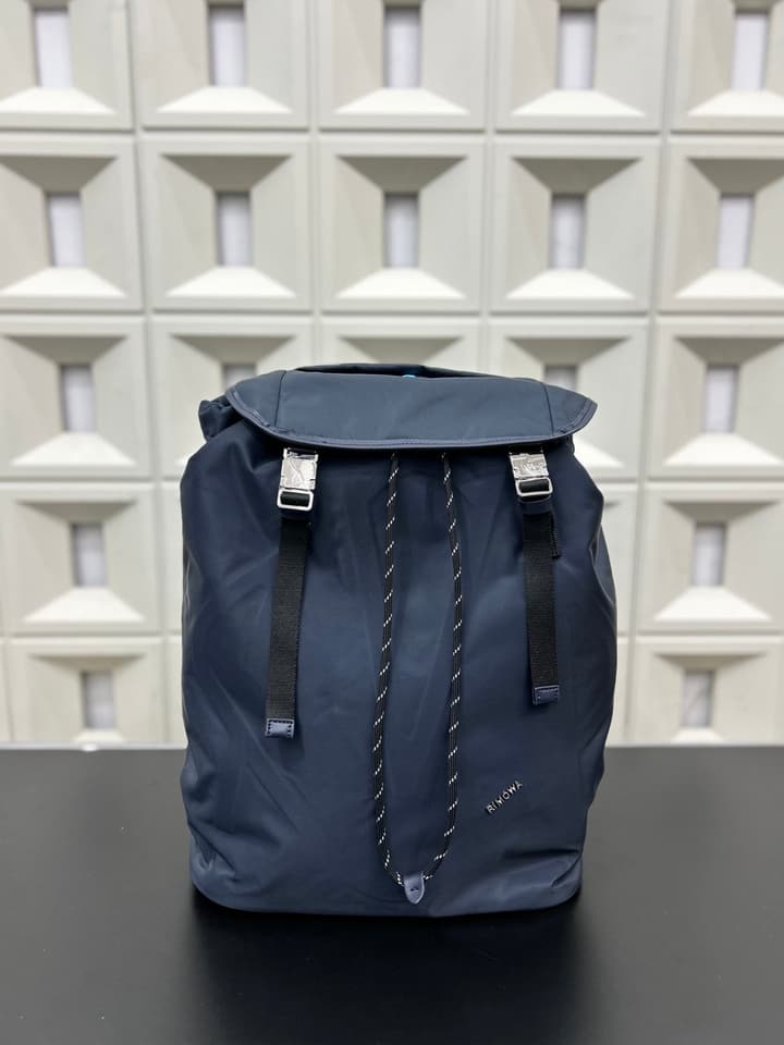 RIMOWA Signature Series Flap Drawstring Backpack in Classic Black