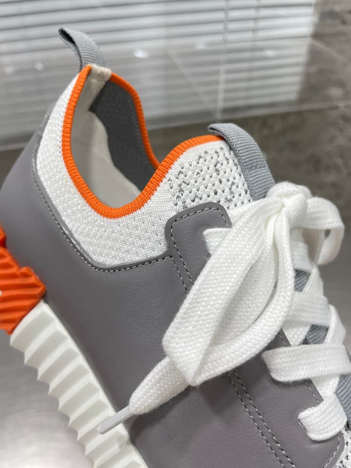 Hermès Sport Sneakers – Iconic Orange Edge in Black Knit With Black Laces