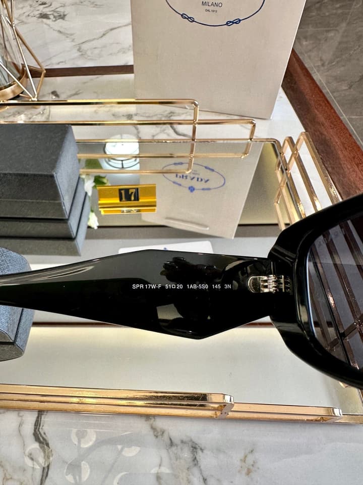 Prada Polarized Acetate Sunglasses in Glossy Black Frontal