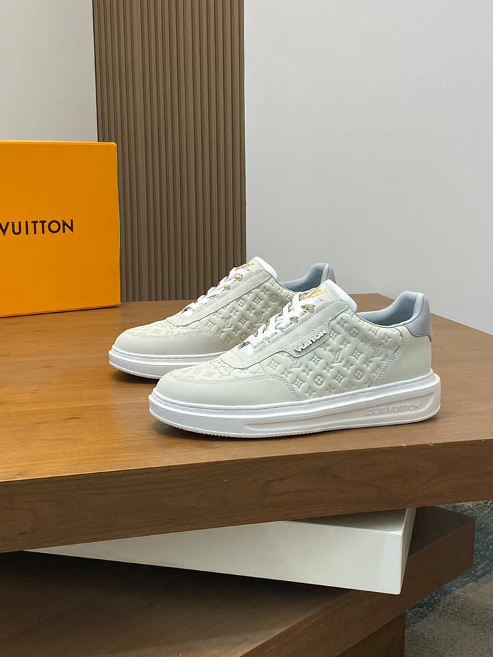 Louis Vuitton Embossed Calfskin Sneakers in Black