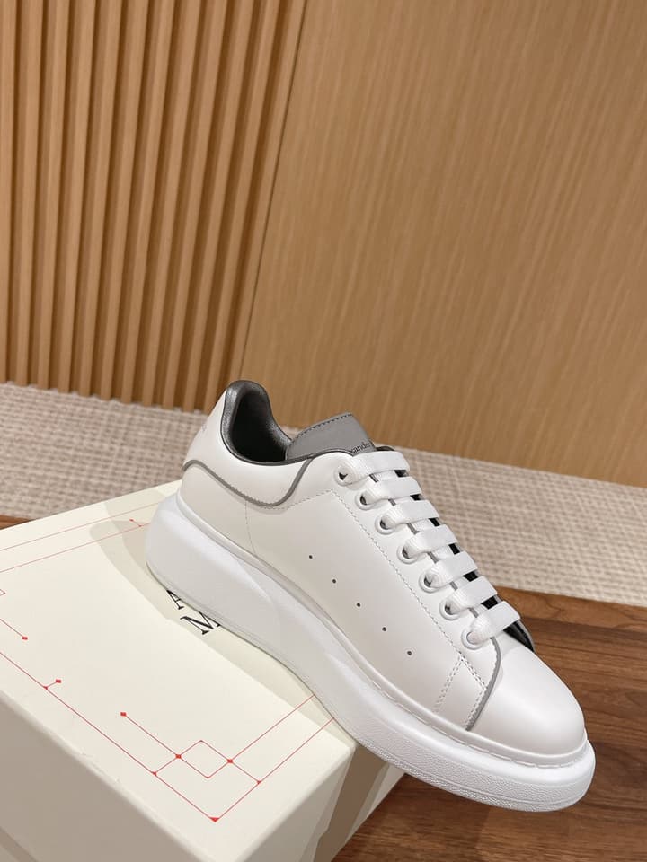 Alexander McQueen Classic Versatile White Sneakers in White With Black Laces & Heel