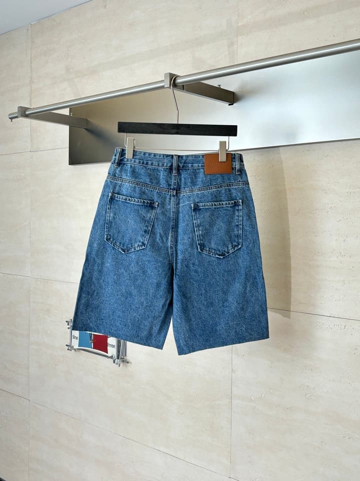 Loewe Anagram Laser-Cut Denim Shorts in Blue Denim
