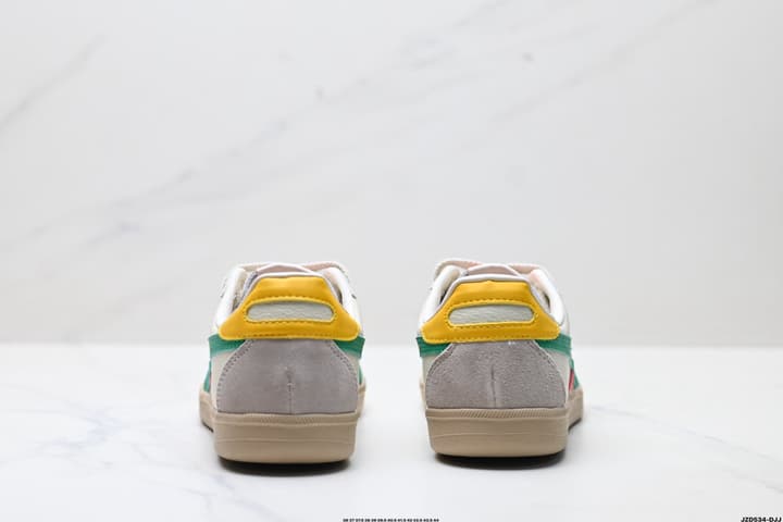 Asics Onitsuka Tiger Tokuten Retro Low-Top Sneakers in Cream Upper With Black Stripes And Black Sole