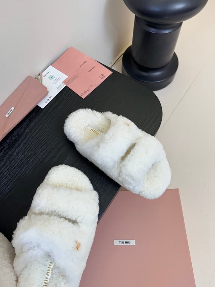 Miu Miu Sheepskin Mules in Black