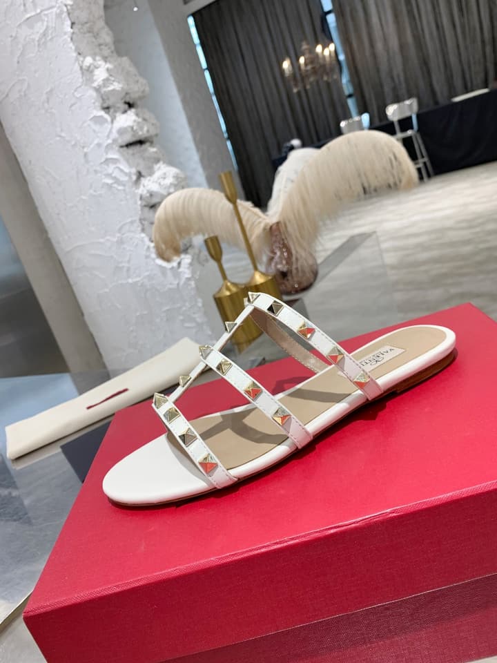 Valentino Studded Sheepskin Flat Sandals in Black