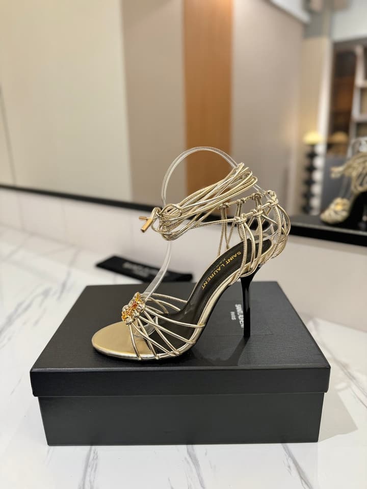 Saint Laurent Letter Buckle Pumps in Bright Gold