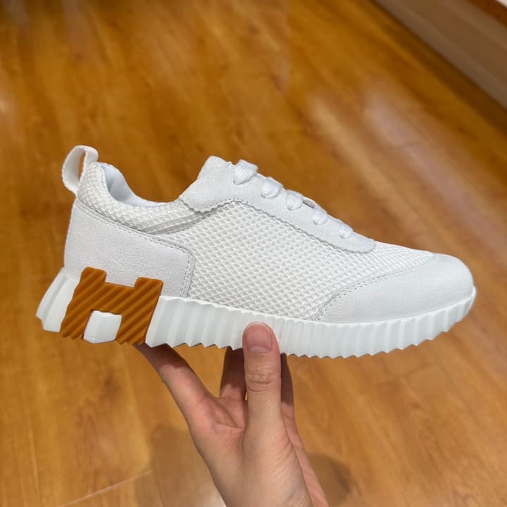 Hermès Bouncing Sneakers in Bright White With Orange H