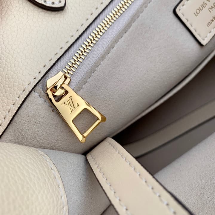 Louis Vuitton OnTheGo Medium Monogram Empreinte Tote in Cream Monogram Empreinte