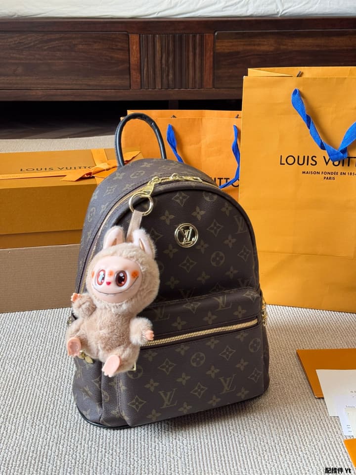 Louis Vuitton Monogram Mini Backpack in Monogram With Light Blue Charm