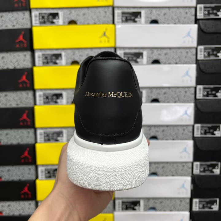Alexander McQueen Oversized Low-Top Sneakers in All Black With White Sole