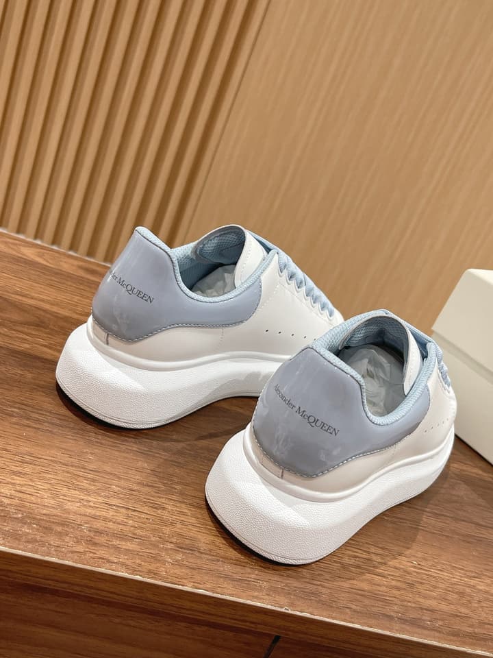 Alexander McQueen Classic Versatile White Sneakers in White With Black Laces & Heel