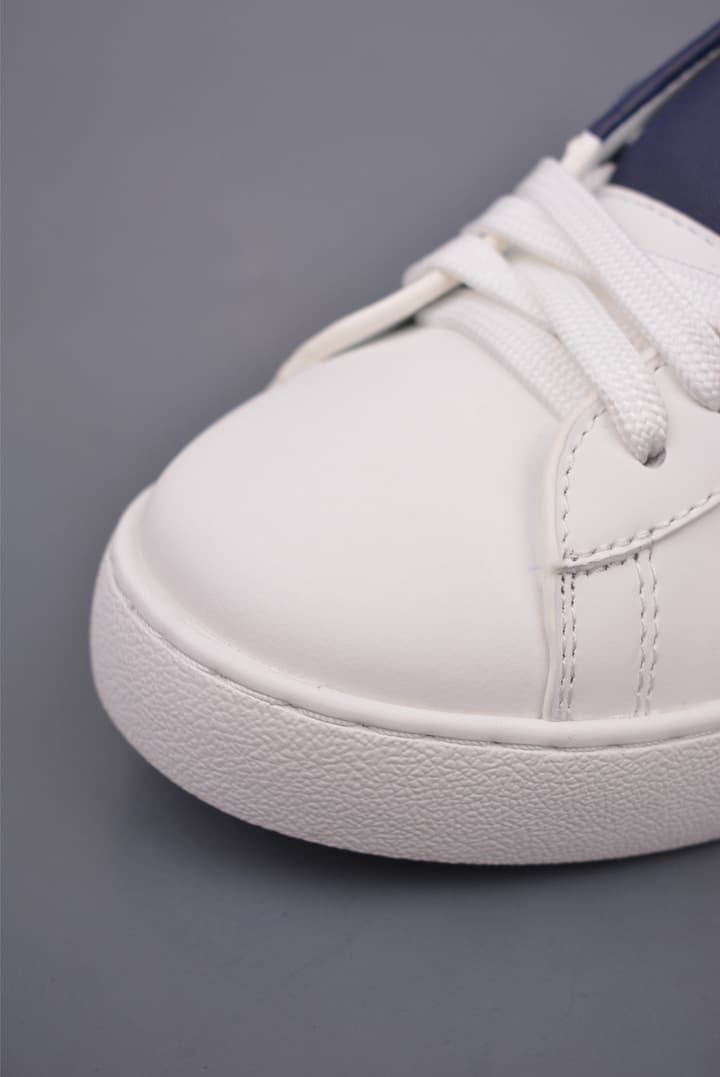 Valentino Rockstud Untitled Rivet Sneakers – 2025 Collection in White With Black Band