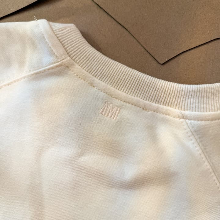 AMI Paris Ami de Coeur Raglan Crewneck Sweatshirt – 25FW in Apricot With Clear Heart