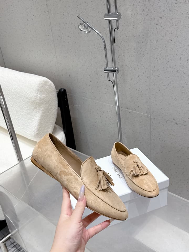 The Row Tassel Loafers in Black Suede