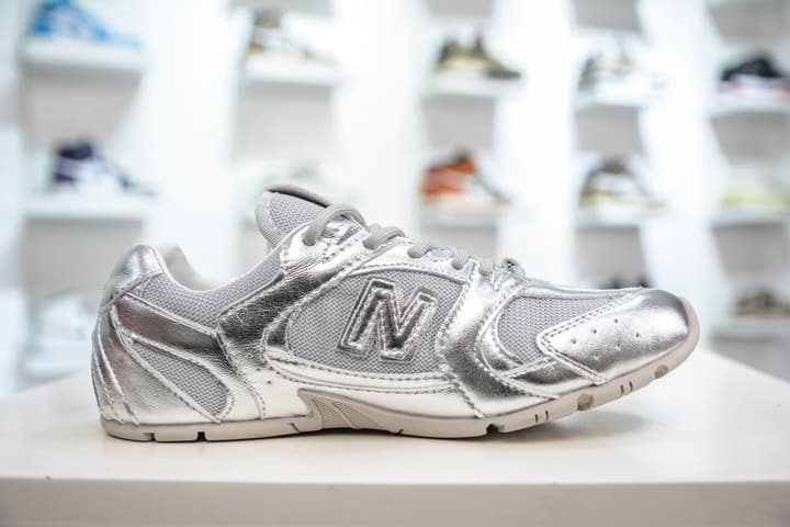 Miu Miu x New Balance MR530 SL Distressed Sneakers in Beige