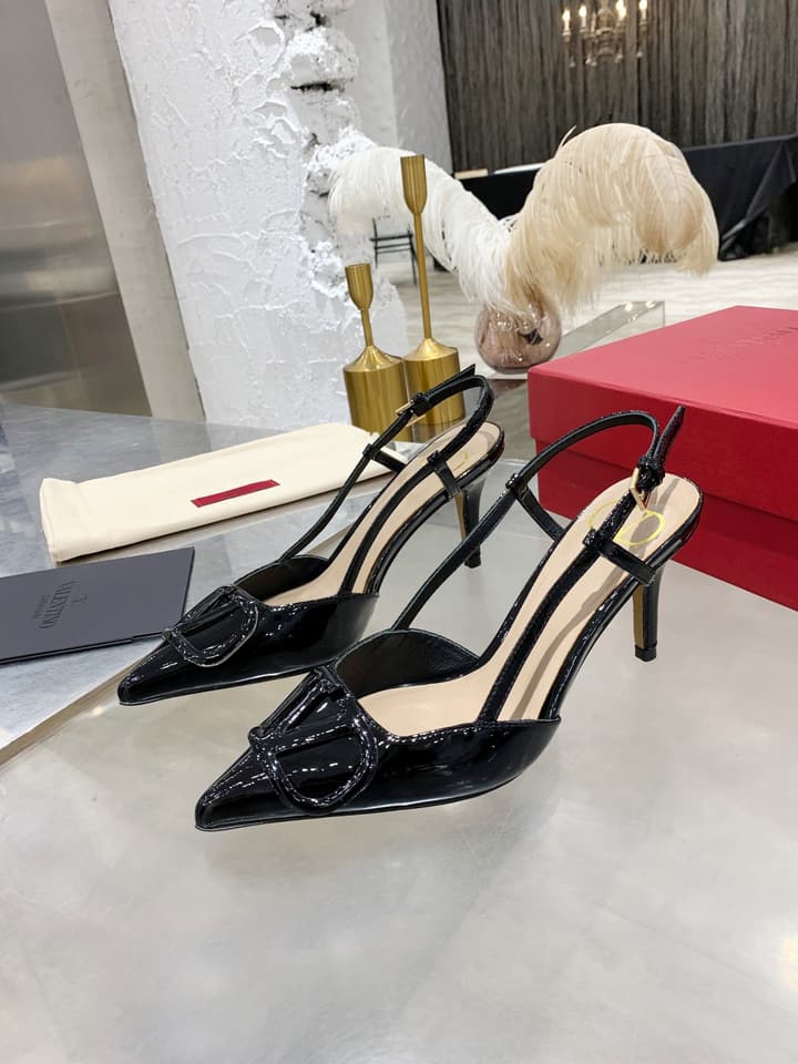 Valentino VLogo Pointed-Toe Patent Leather Pumps in Black Patent