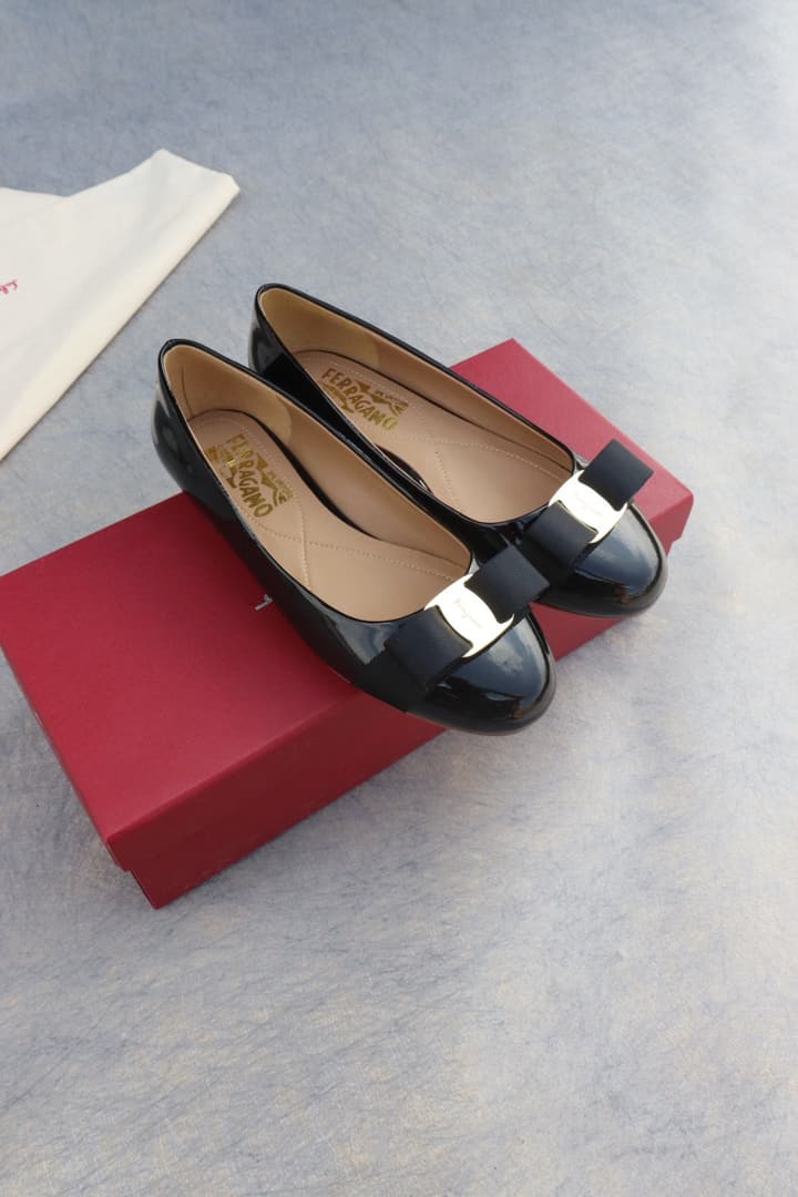Ferragamo Classic Patent Leather Flats in Black Patent Vara Flats