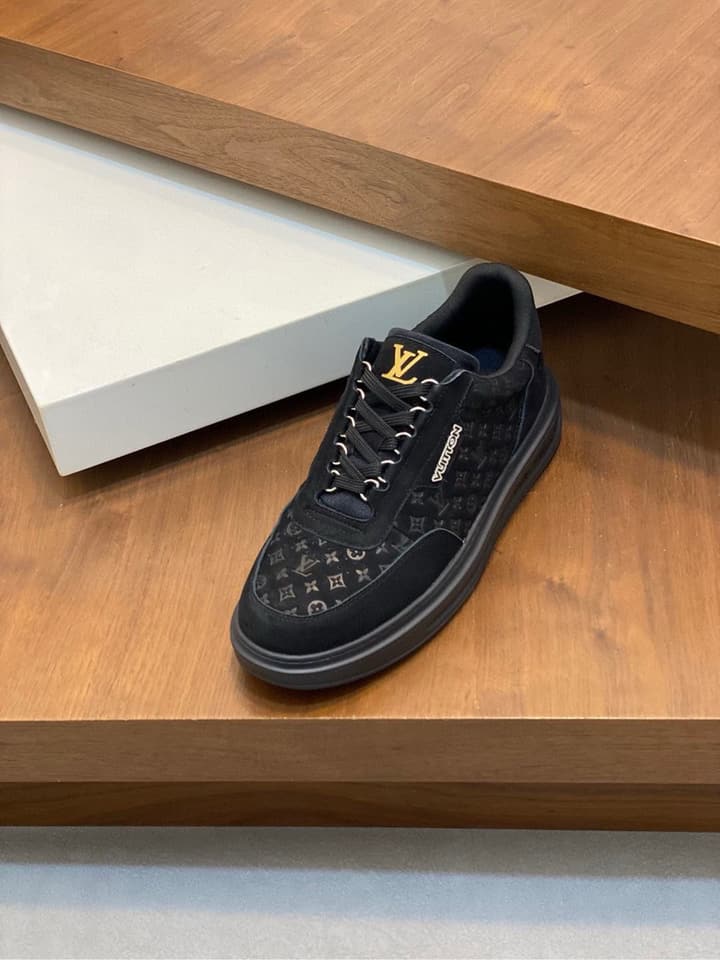 Louis Vuitton Embossed Calfskin Sneakers in Black