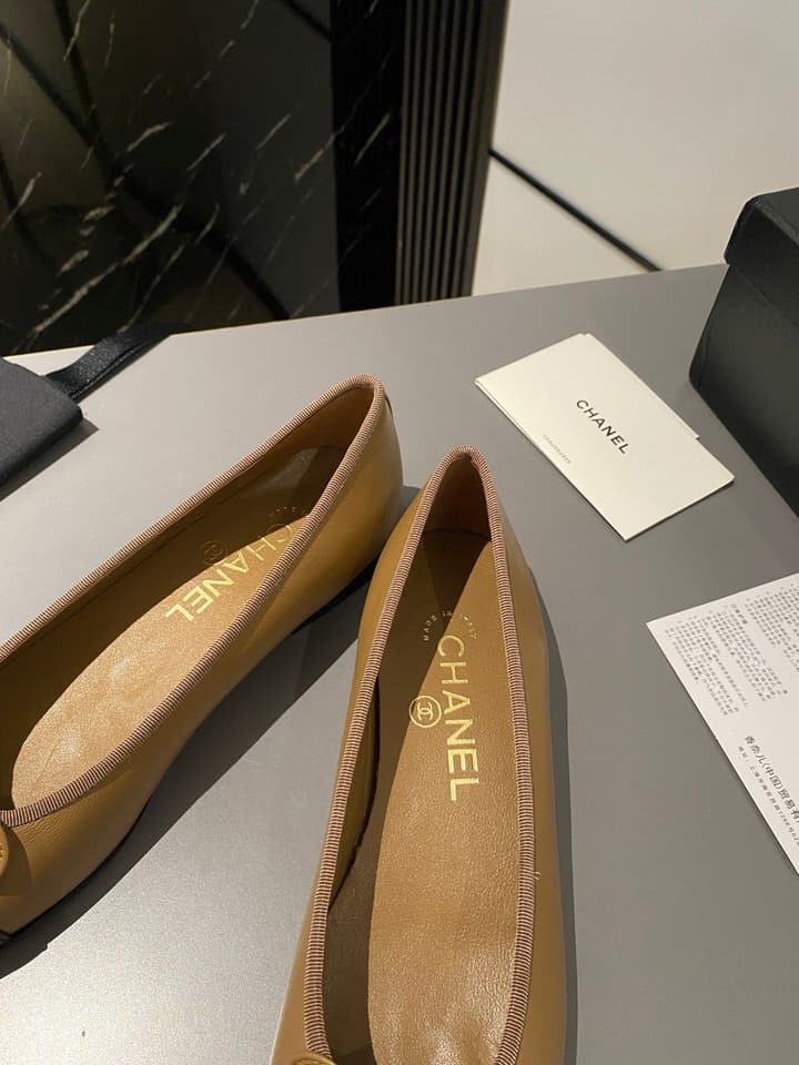 Chanel Classic Ballet Flats in Tan With Black Cap Toe