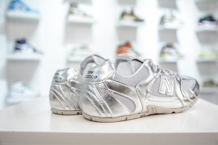 Miu Miu x New Balance MR530 SL Distressed Sneakers in Beige