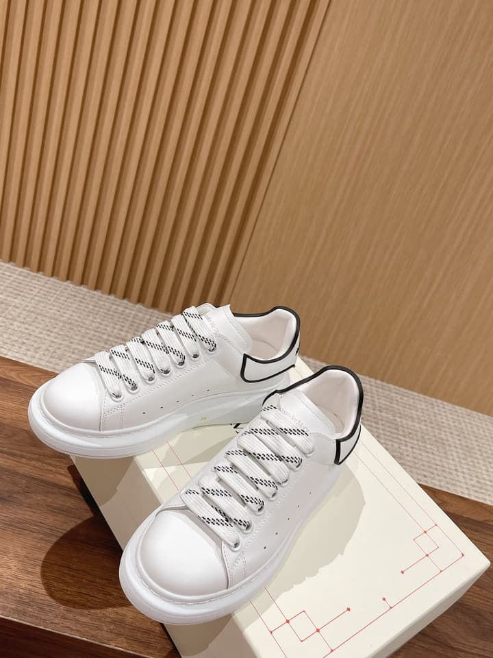 Alexander McQueen Classic Versatile White Sneakers in White With Black Laces & Heel