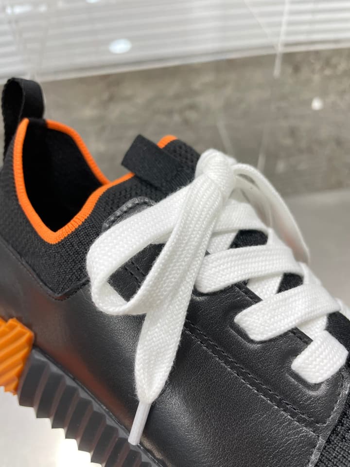 Hermès Sport Sneakers – Iconic Orange Edge in Black Knit With Black Laces