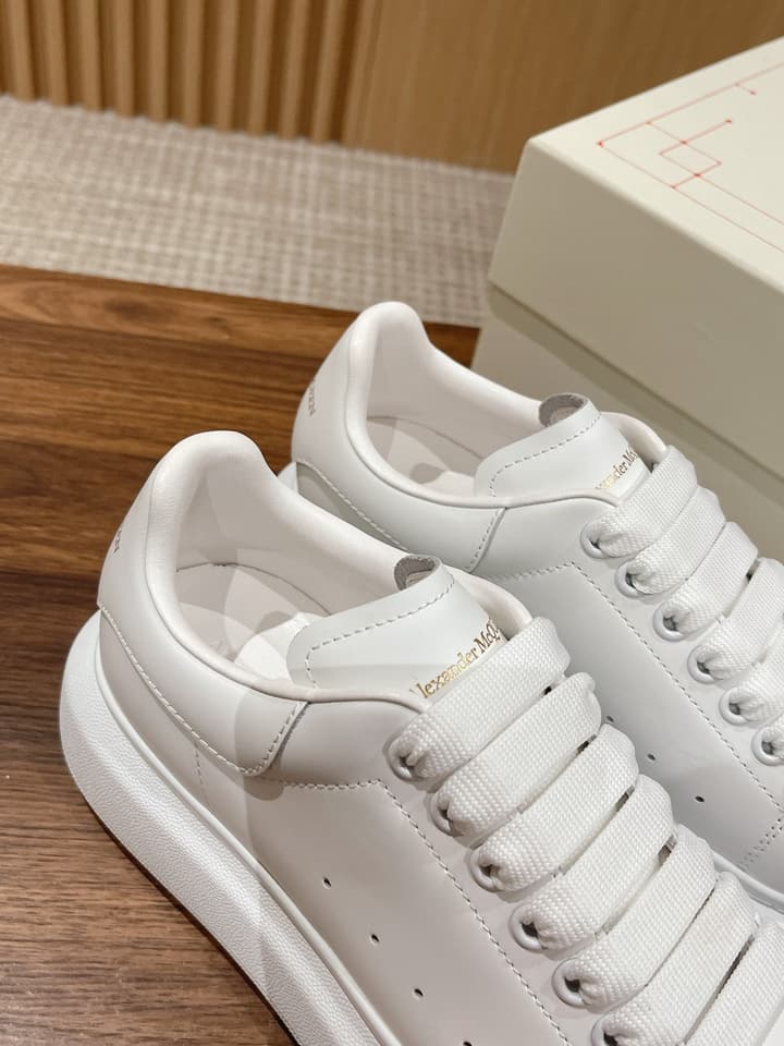 Alexander McQueen Classic Versatile White Sneakers in White With Black Laces & Heel