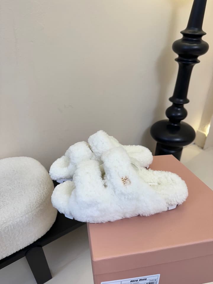 Miu Miu Sheepskin Mules in Black
