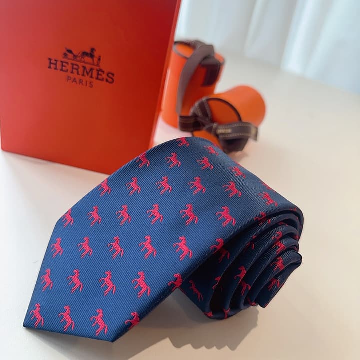 Hermès Animal Series Men's Silk Tie in Blue With Pink Pattern