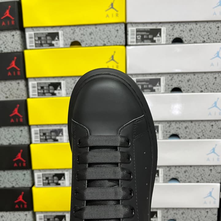 Alexander McQueen Oversized Low-Top Sneakers in All Black With White Sole