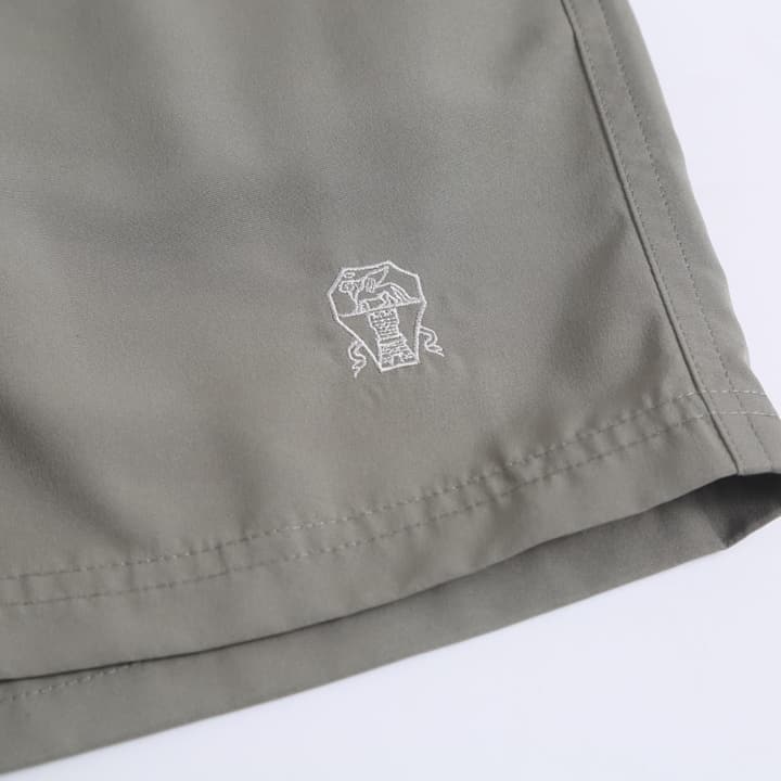 Brunello Cucinelli Embroidered Swim Trunks in Navy Blue