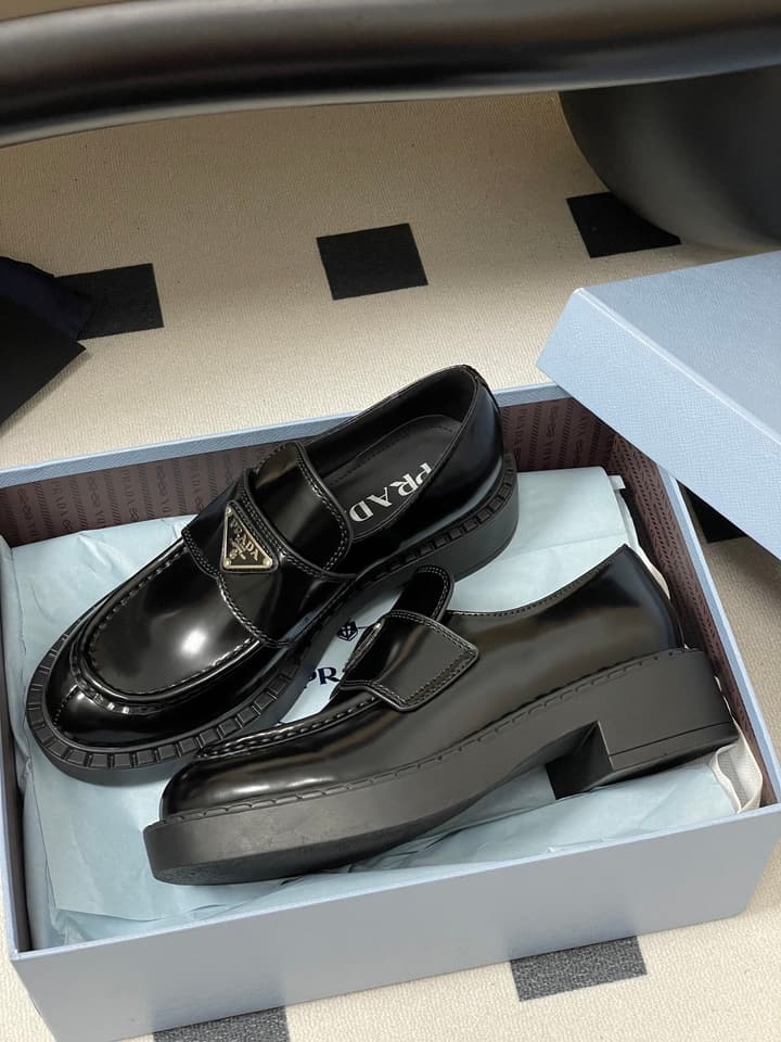 Prada Triangle Logo Platform Loafers in Black