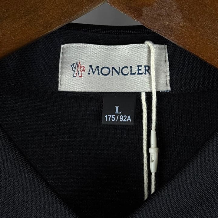 Moncler Classic Embroidered Long-Sleeve Polo Shirt in Black Polo - Hanging Display