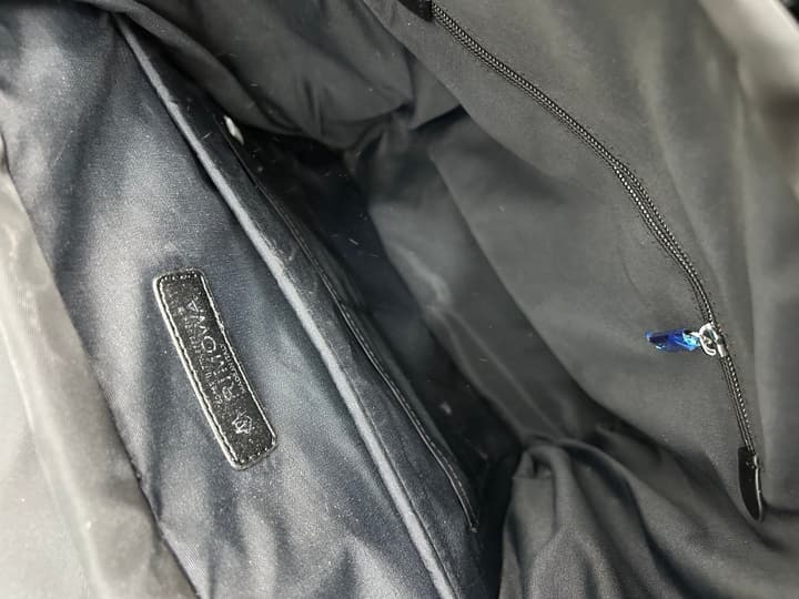 RIMOWA Signature Series Flap Drawstring Backpack in Classic Black
