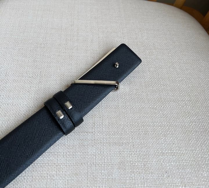 Prada Triangle Logo Buckle Belt in Black Textured Leather With Black Buckle