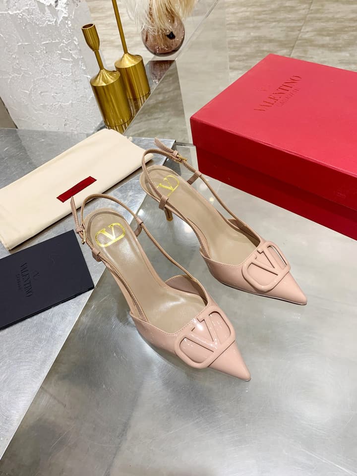 Valentino VLogo Pointed-Toe Patent Leather Pumps in Black Patent