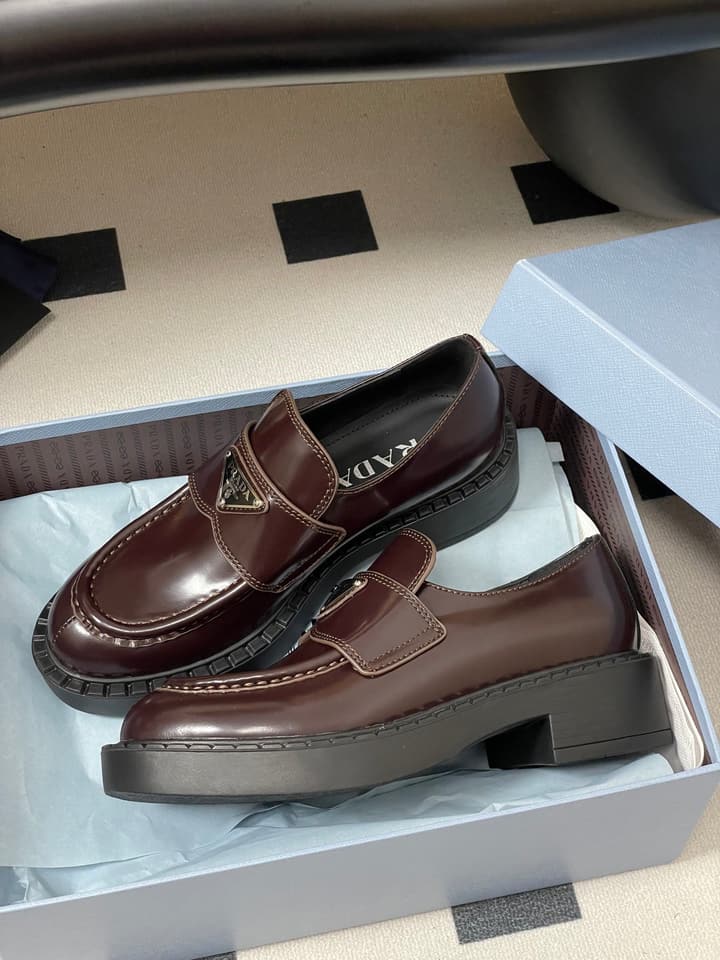 Prada Triangle Logo Platform Loafers in Black