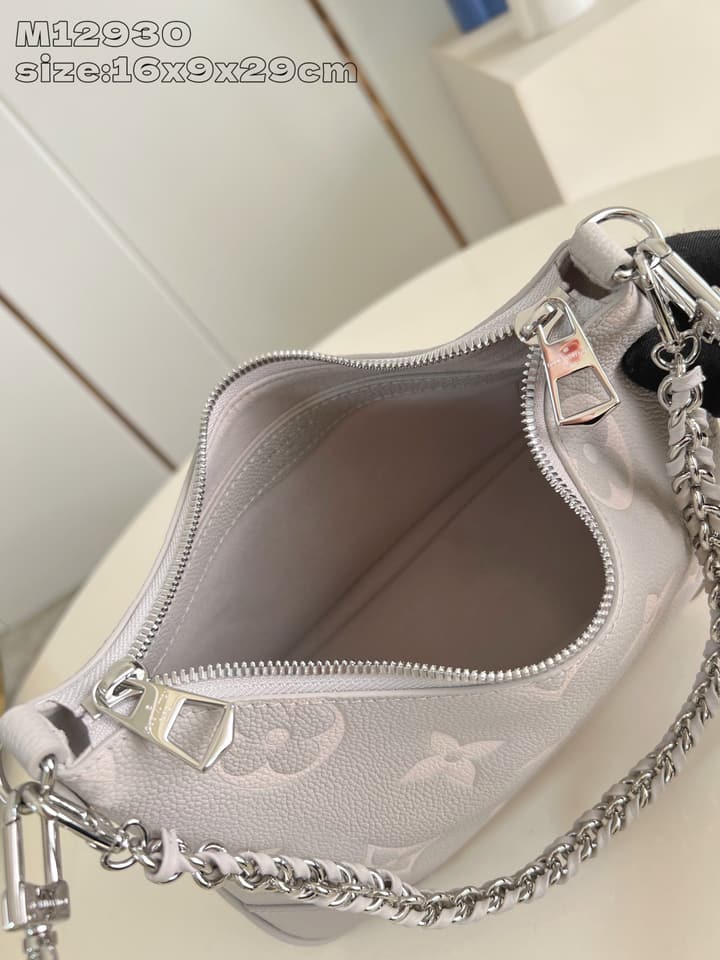 Louis Vuitton Boulogne Monogram Embossed Bag in Beige