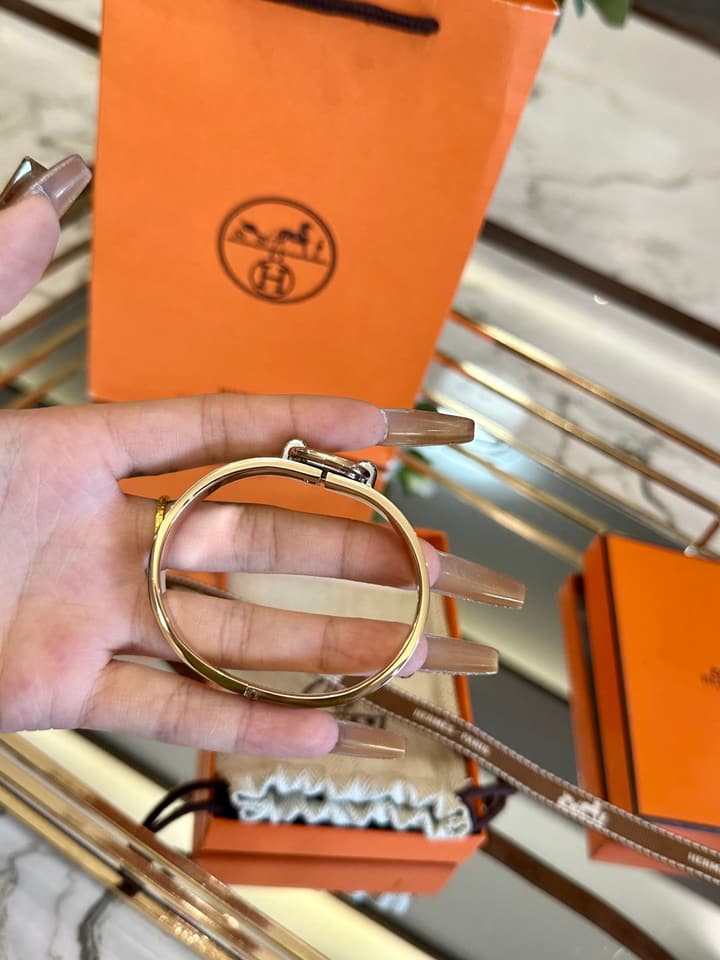 Hermès Pig Nose Enamel Bracelet in Gold